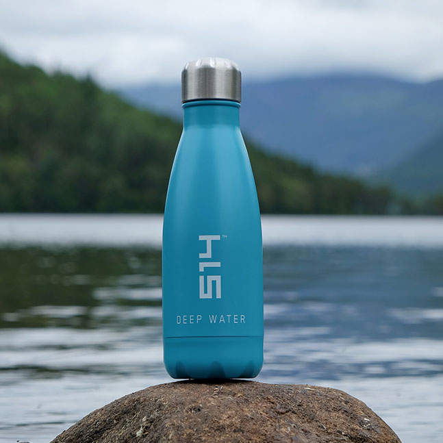 Water Bottle on Rock Water Bottle on Rock